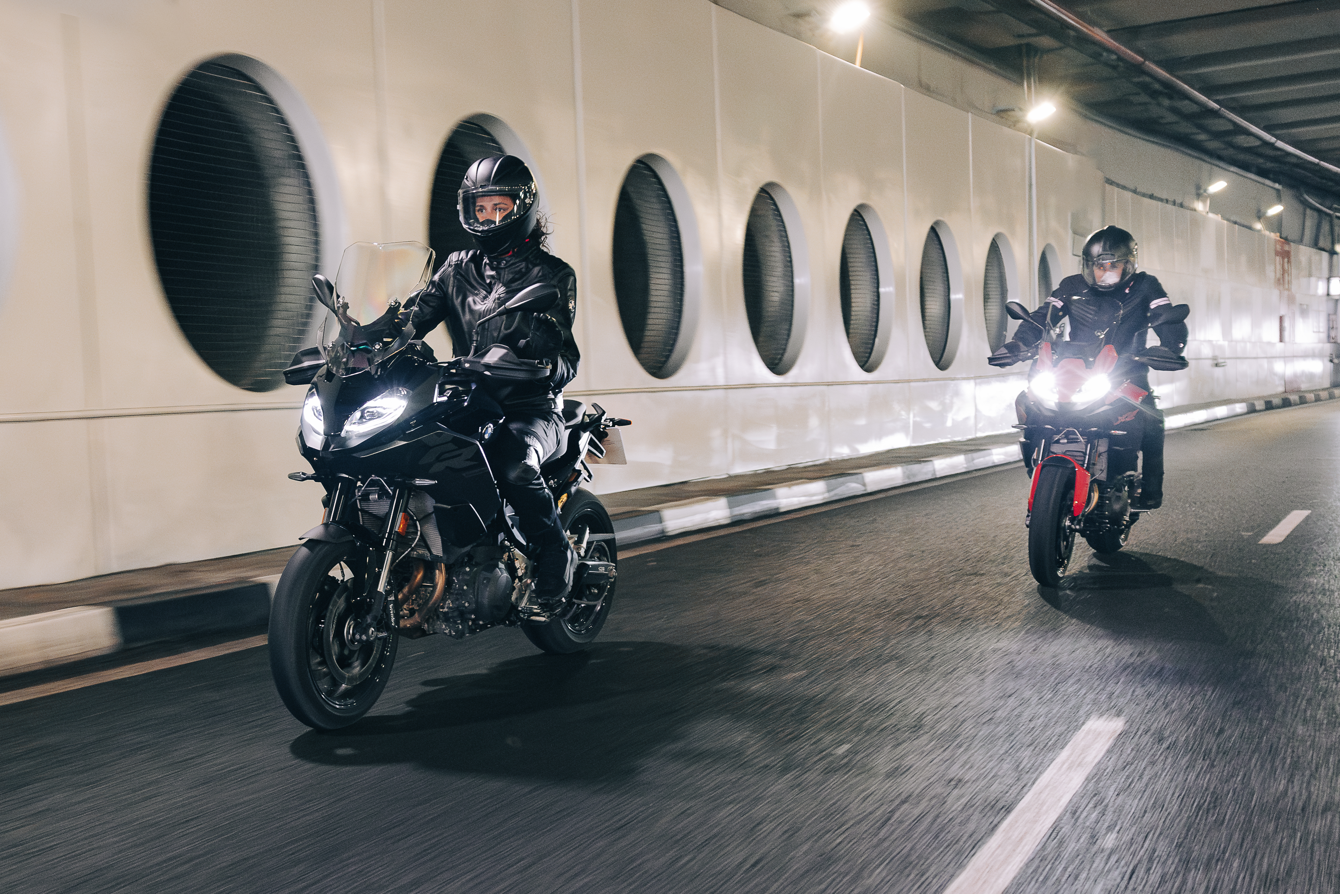 BMW F 900 XR riders in tunnel