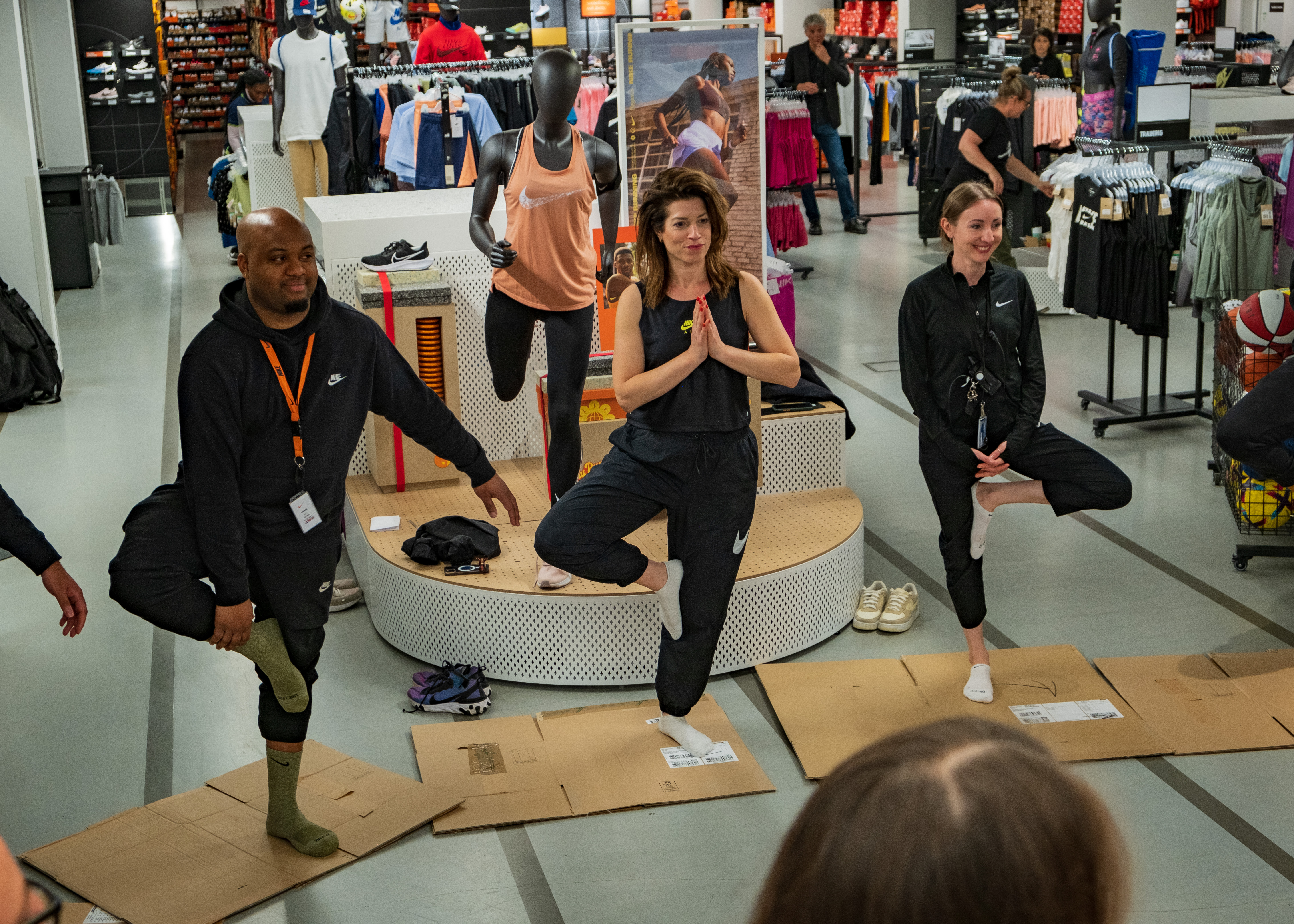 In-store yoga session as part of Nike Move to Zero activation